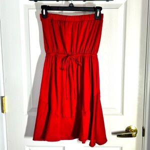 Strapless red cotton dress umpires waist.